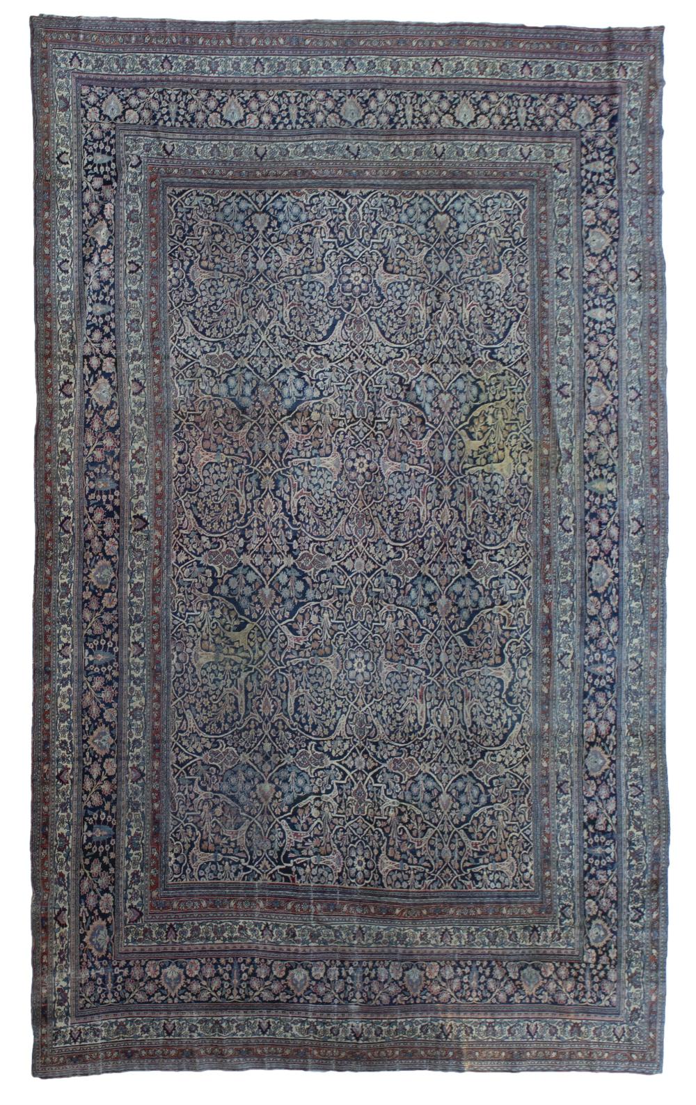 Appraisal: A large Persian area rug First-quarter th Century Wool on