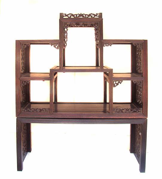 Appraisal: A Chinese pierce carved etagere height ft in width in