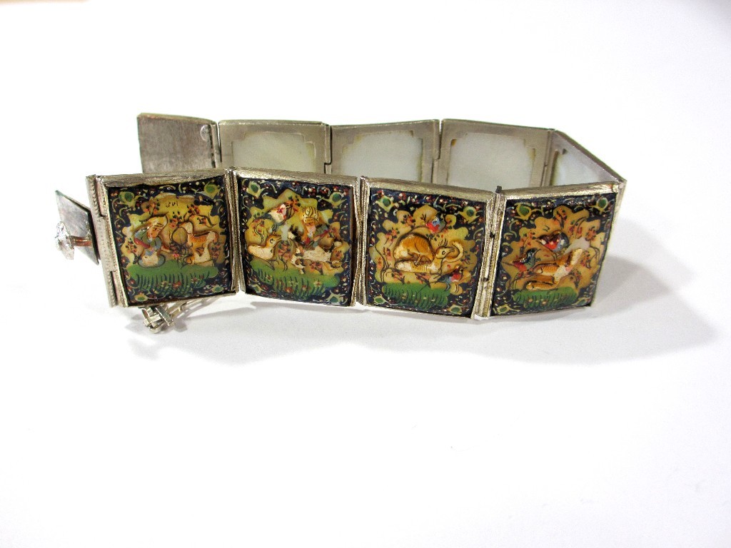 Appraisal: An Indo Persian silver bracelet with eight mother of pearl