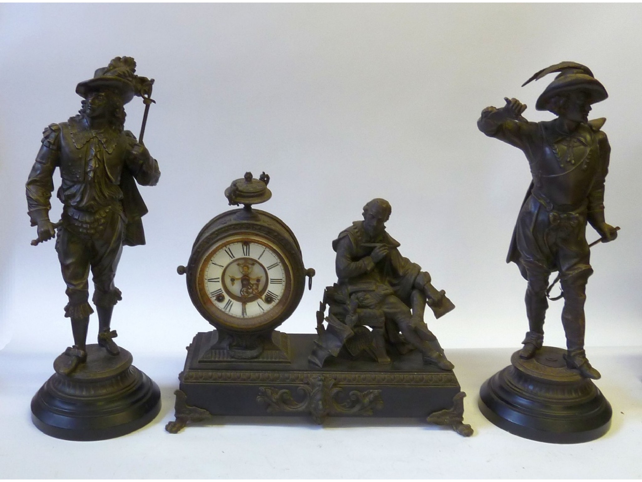 Appraisal: A VICTORIAN DARK PATINATED SPELTER MANTLE CLOCK the dial with