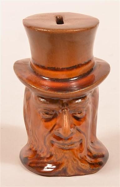 Appraisal: Glazed Earthenware Uncle Sam Still Bank Glazed Earthenware Pottery Uncle