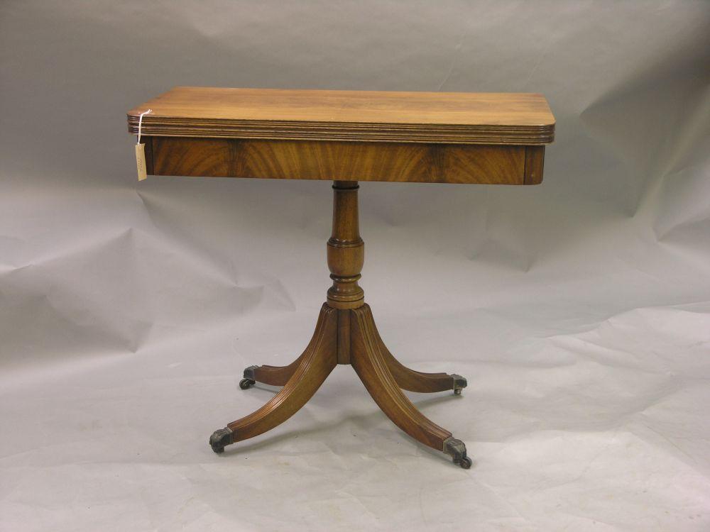 Appraisal: A Georgian style mahogany card table quarter-veneered 'D' shape top