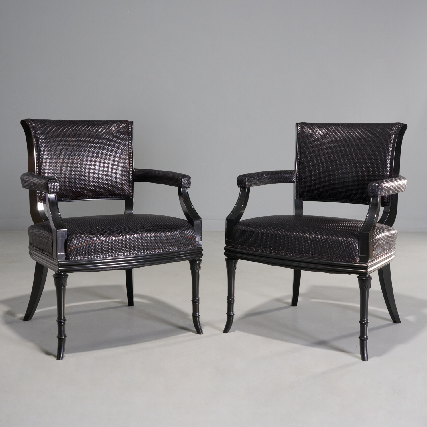 Appraisal: PAIR WOVEN LEATHER ARMCHAIRS PETER MARINO th c USA dark