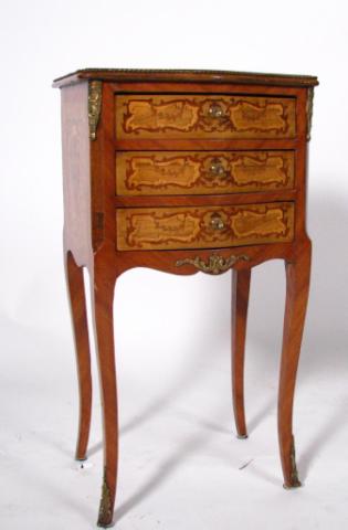 Appraisal: French-style three-drawer petit table with inlaid top and drawer fronts