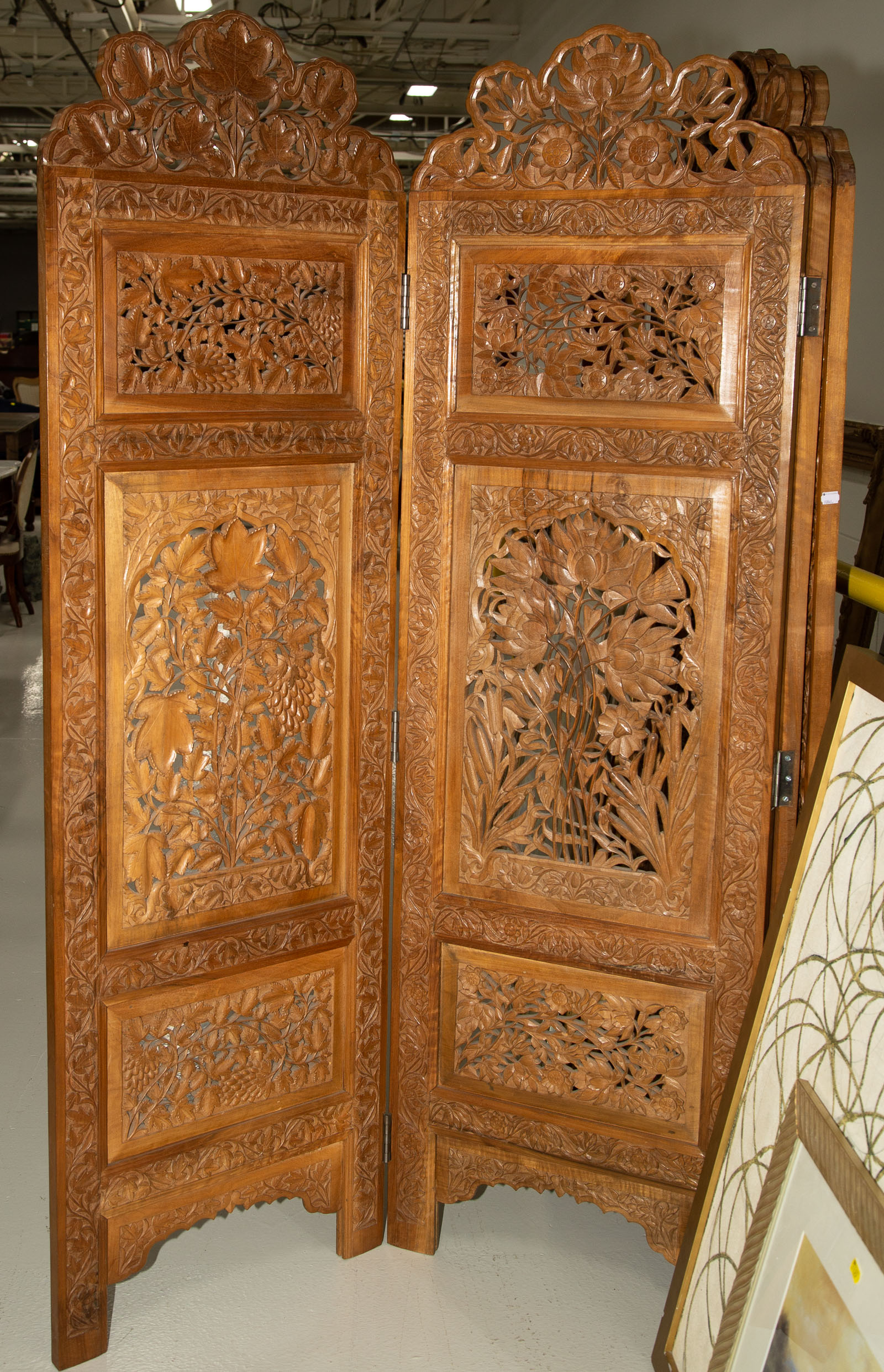 Appraisal: ORNATELY CARVED INDIAN FOUR PANEL SCREEN Approximately in H each