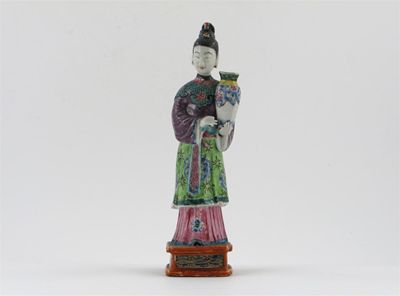 Appraisal: A Chinese famille rose standing figure of maiden wearing a