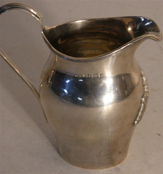 Appraisal: Edward VII silver cream jug with applied crest Birmingham ozs