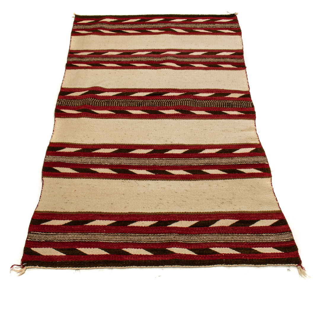 Appraisal: A NAVAJO SADDLE BLANKET WITH RED AND BARBER POLE STRIPES