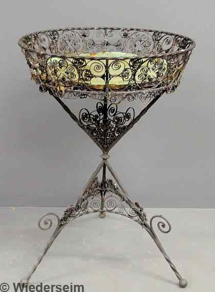 Appraisal: Continental wrought iron round ornate garden planter thc h x