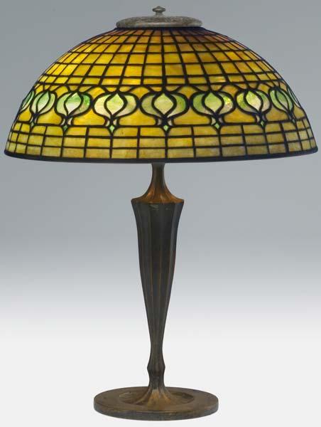 Appraisal: TIFFANY STUDIOS Table lamp with Pomegranate leaded glass shade in