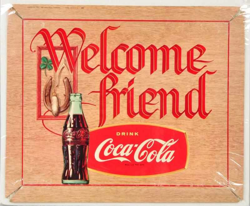 Appraisal: Cardboard Welcome Friend Coca-Cola Sign Description Folds out to make