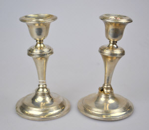 Appraisal: A pair of silver baluster candlesticks Birmingham