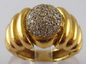 Appraisal: A French hallmarked carat gold diamond set bombe ring approx