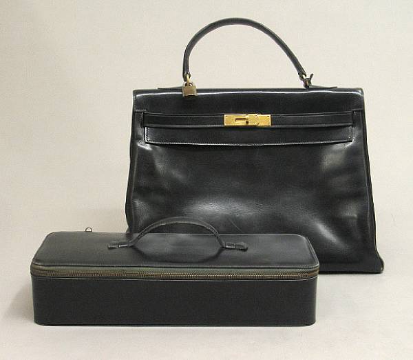 Appraisal: A Herm s Kelly cm handbag with jewelry case In