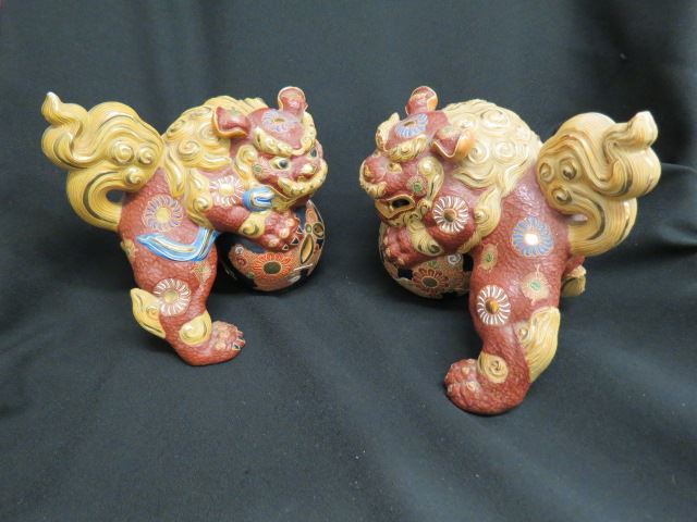 Appraisal: Pair of Chinese Pottery Foo Dog Figurines satsuma style with