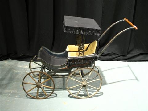 Appraisal: VICTORIAN DOLL STROLLER With black trim - h w in