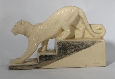 Appraisal: A French earthenware figure of a lioness cast from a