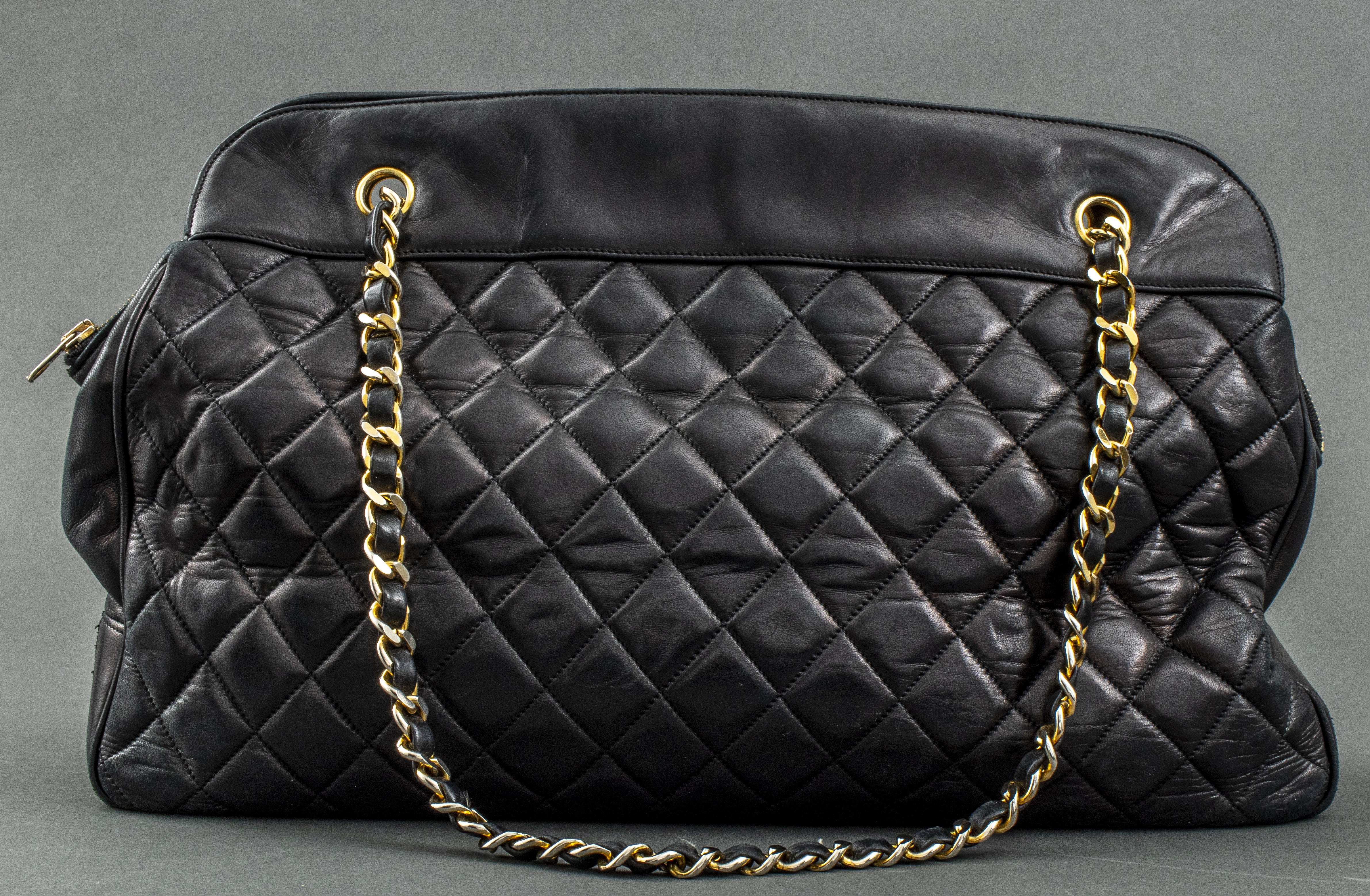 Appraisal: CHANEL BLACK QUILTED LEATHER SHOULDER BAG Vintage Chanel black quilted