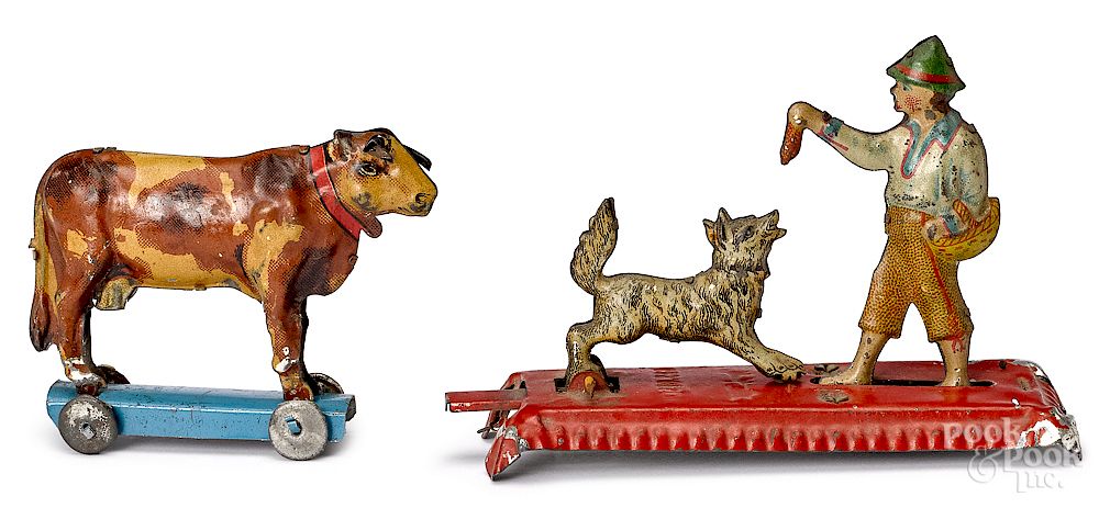 Appraisal: Two tin lithograph penny toys Two tin lithograph penny toys