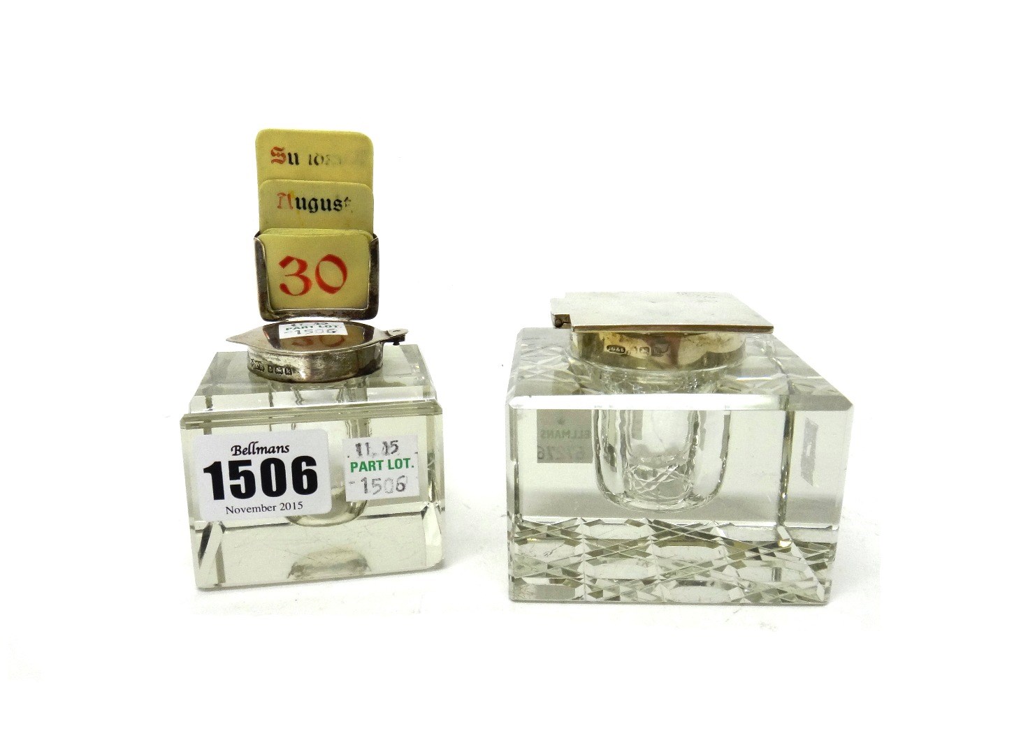 Appraisal: A silver mounted square glass inkwell fitted with a calendar