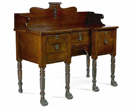 Appraisal: A Regency mahogany sideboard Probably Scottish of inverted breakfront form