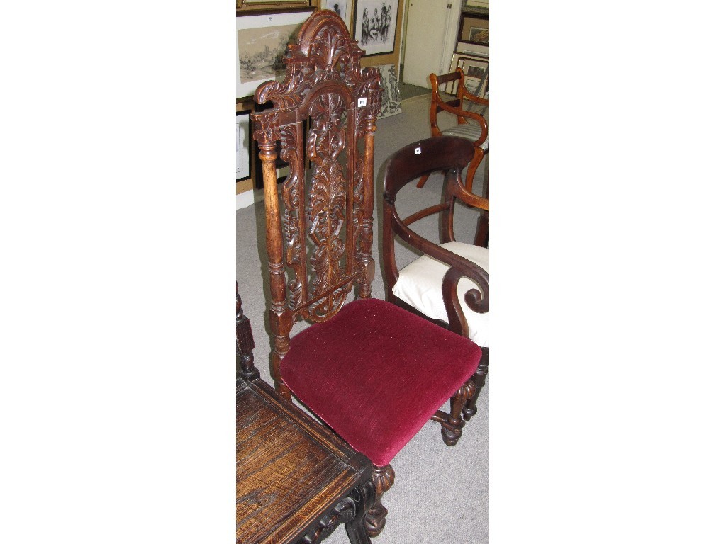 Appraisal: Carved oak high back hall chair