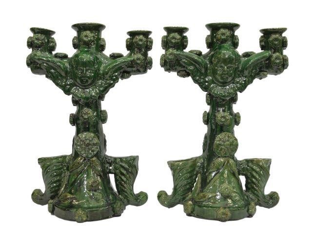 Appraisal: Large Mexican green majolica glazed ceramic candelabras each centering winged