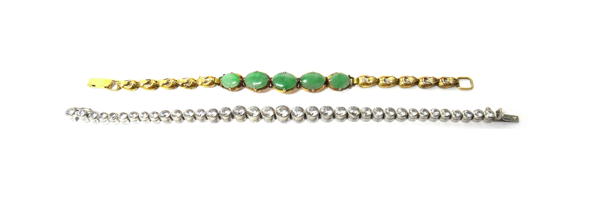 Appraisal: A gold and jade set bracelet mounted with a row