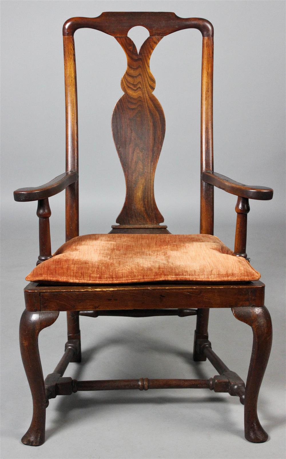 Appraisal: QUEEN ANNE ELMWOOD ARM CHAIR having a shaped crest over