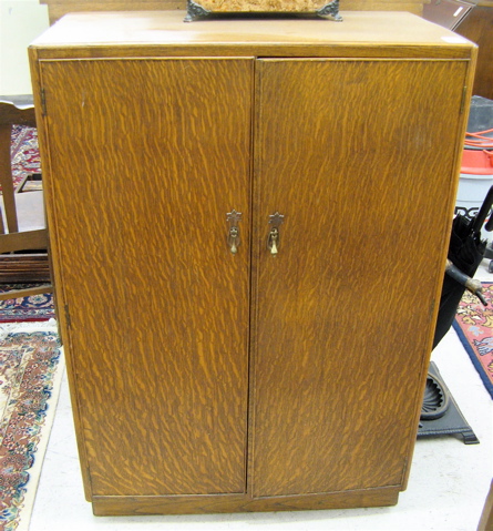 Appraisal: SMALL OAK DOUBLE-DOOR WARDROBE English mid th century with two