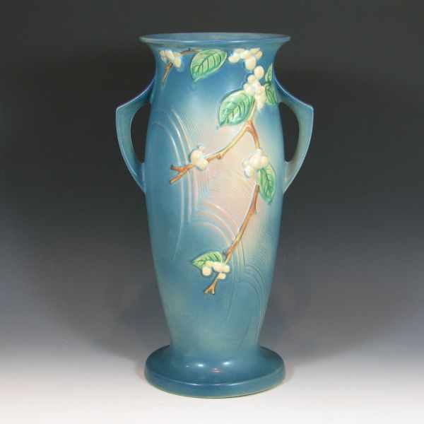 Appraisal: Roseville Snowberry floor vase in blue Marked Roseville USA V-