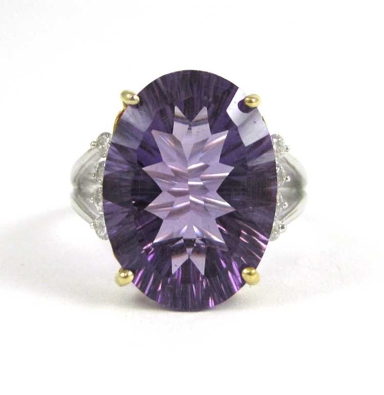 Appraisal: AMETHYST DIAMOND AND FOURTEEN KARAT RING The white and yellow