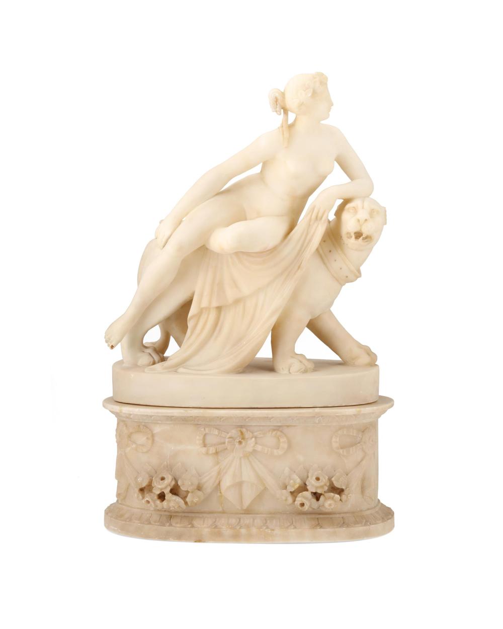 Appraisal: A carved alabaster sculpture of a seated woman and lion