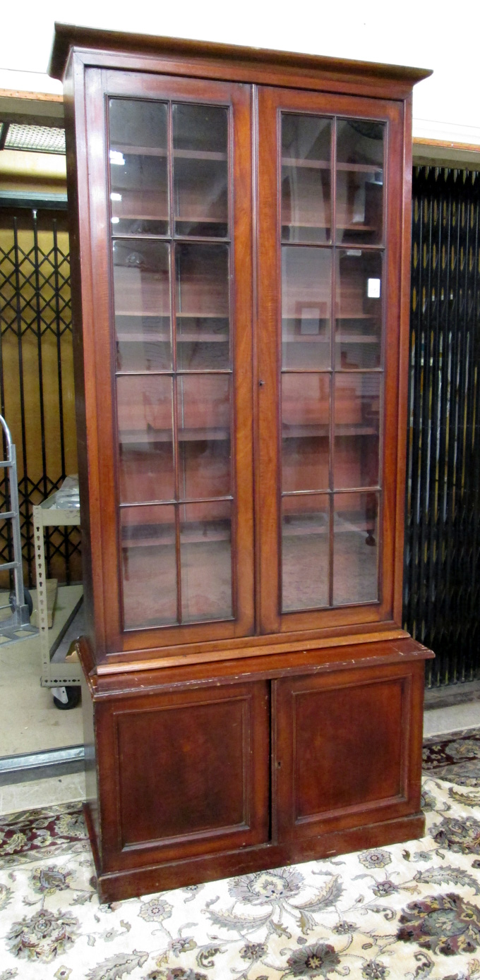 Appraisal: FEDERAL MAHOGANY LIBRARY CABINET BOOKCASE ON CUPBOARD American th century