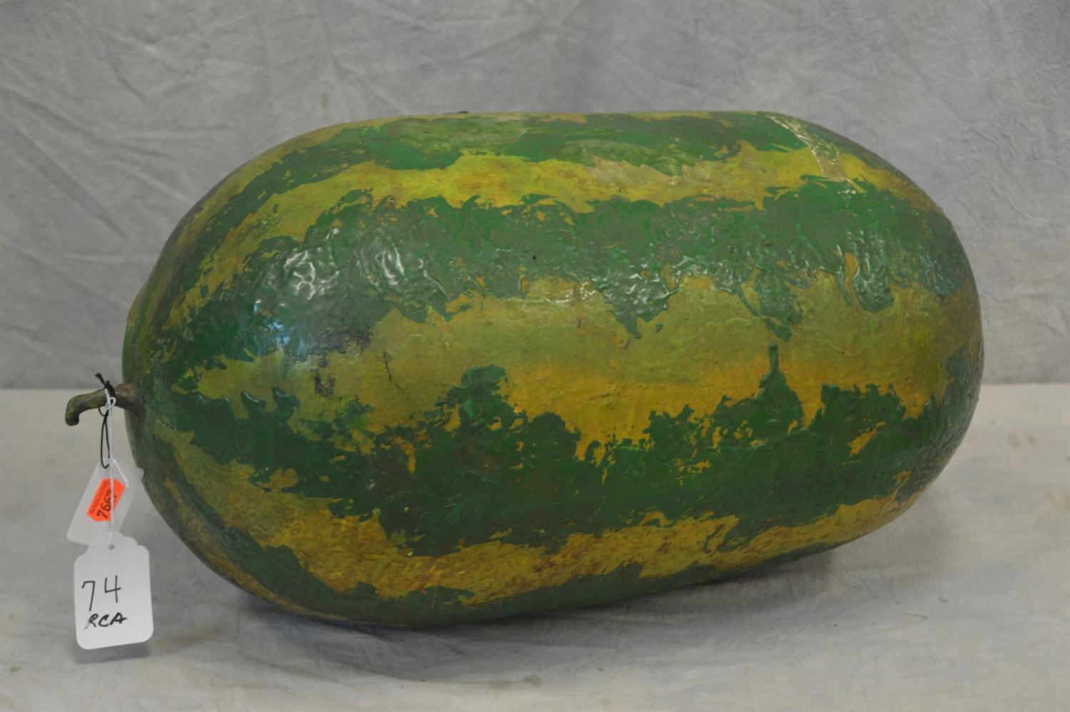 Appraisal: Wax coated paper mache watermelon green yellow painted decoration probably