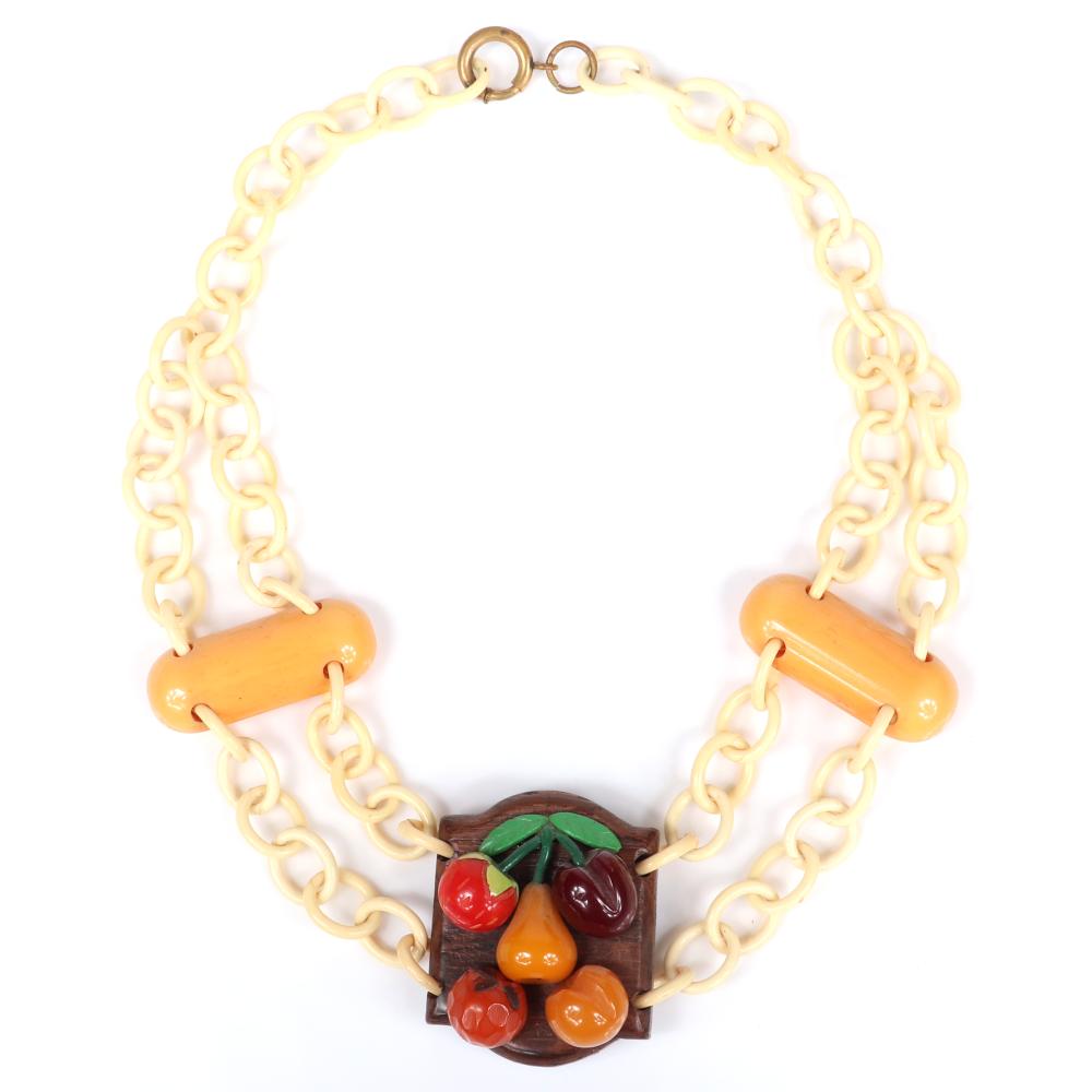 Appraisal: VINTAGE BAKELITE FRUIT MEDALLION STATION NECKLACE WITH MINIATURE CARVED FRUIT