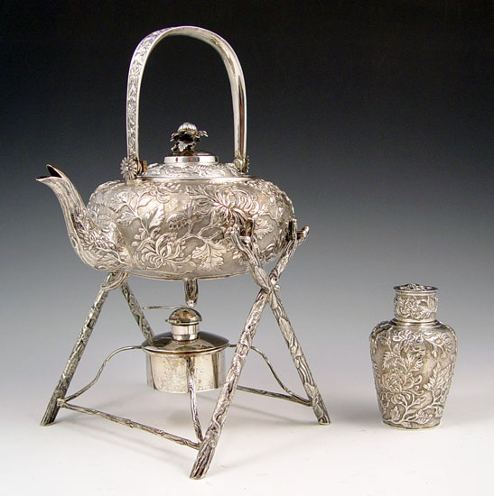 Appraisal: CHINESE SILVER CHASED KETTLE ON STAND TEA CADDY Chinese silver