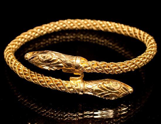 Appraisal: Lady's K yellow gold snake-form bangle bracelet grams