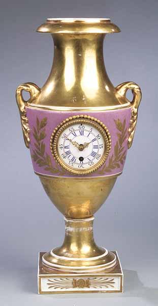 Appraisal: A Paris Porcelain Urn-Form Mantel Clock th c heavily gilt