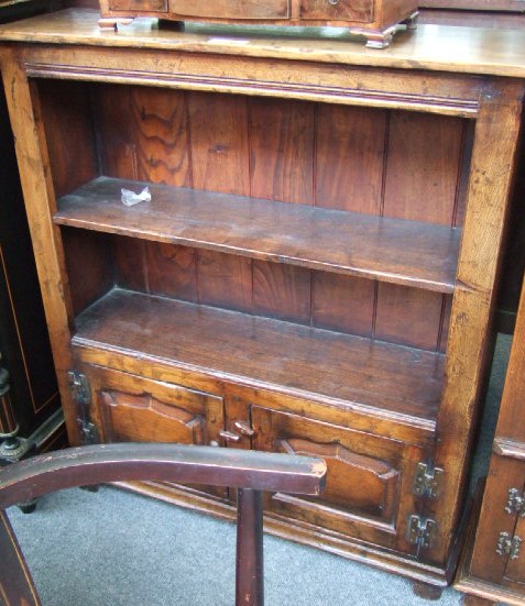 Appraisal: A th century oak floor standing bookcase the pair of