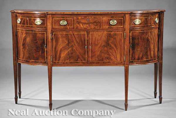 Appraisal: A Federal Inlaid Mahogany Sideboard c shaped top over conforming