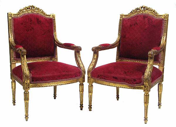 Appraisal: A pair of Louis XVI style carved giltwood armchairs height