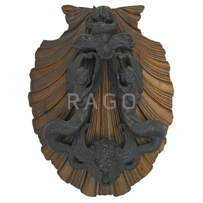 Appraisal: CONTINENTAL FIGURAL BRONZE DOOR KNOCKER Two mermaids surmounted by dolphins