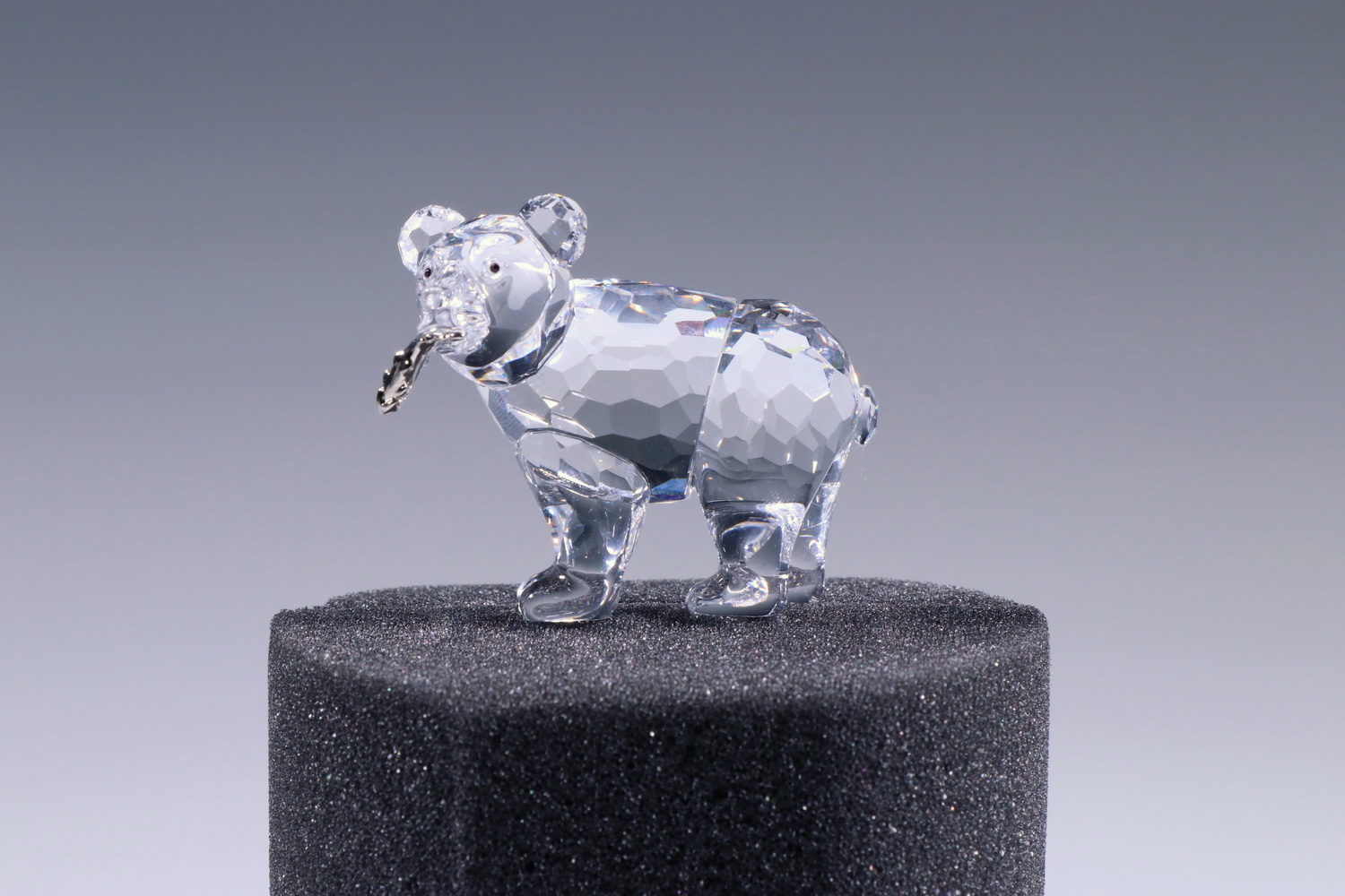 Appraisal: SWAROVSKI CRYSTAL BEAR Swarovski Crystal Grizzly Bear Cub with silver