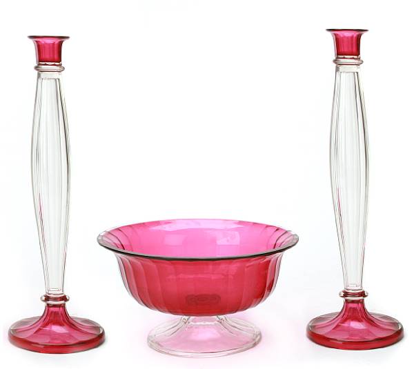 Appraisal: A cranberry and clear glass five-piece table garniture comprising four