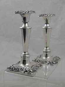 Appraisal: A pair of silver candlesticks measuring approx cm hallmarked Birmingham