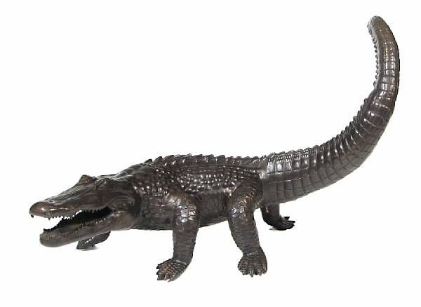 Appraisal: A patinated bronze figure of a crocodile height in width