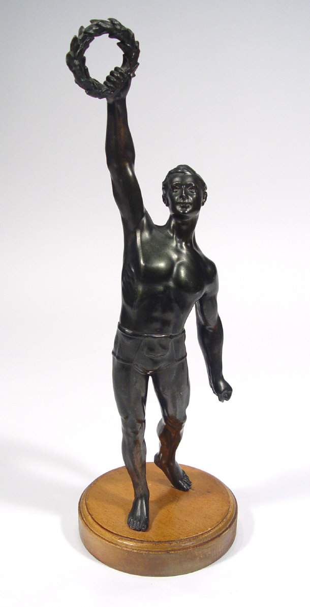 Appraisal: Spelter figure of an athlete clutching a laurel wreath on