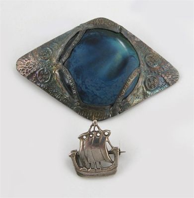 Appraisal: An Iona style silver brooch cast in low relief as