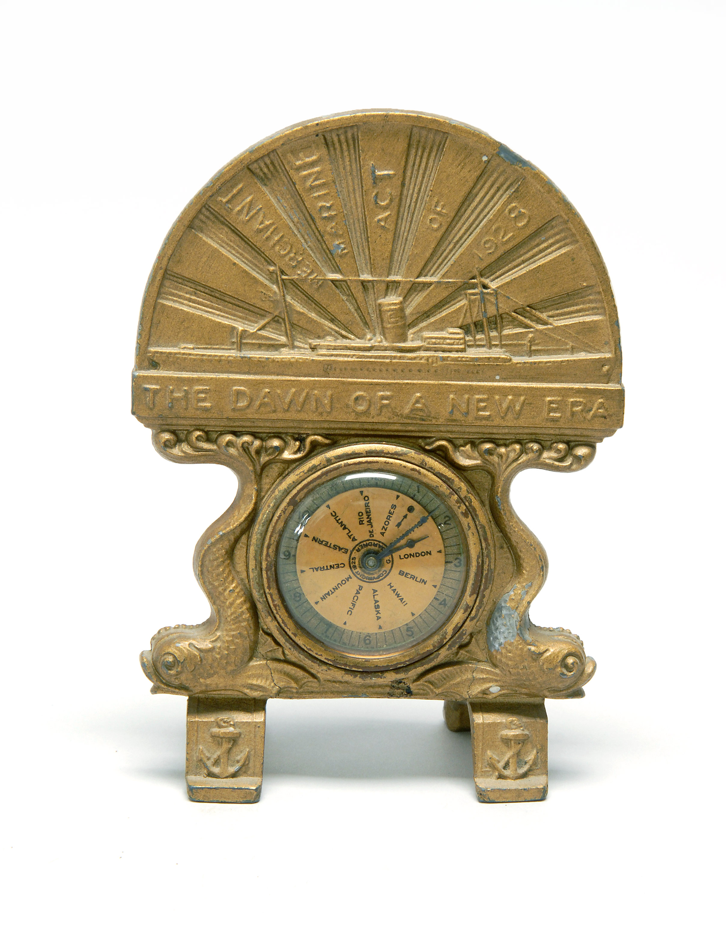 Appraisal: CAST METAL SHELF CLOCK WITH MARINE MOTIFS Upper crest depicts